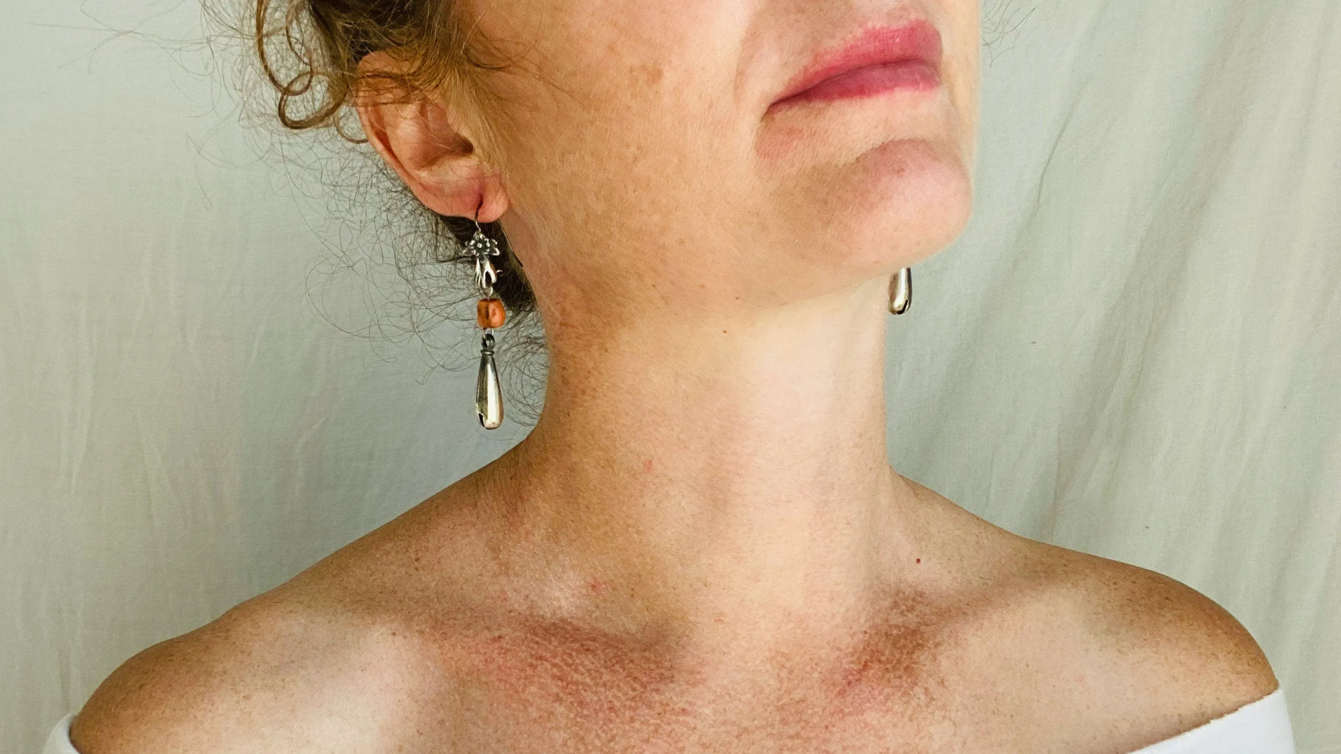 Coral and Sterling Silver Earrings. Cast Hand and Monte Alban Bells.