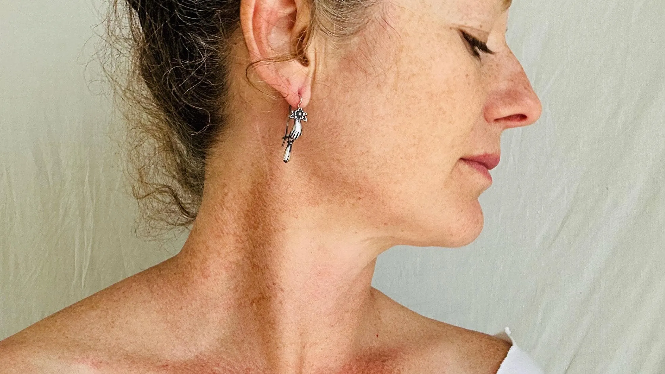 Sterling Silver Earrings. Cast Hand and Monte Alban Bells. 2587